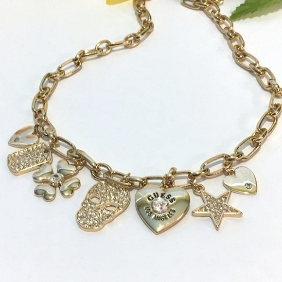 𝅺3/$29! Guess Necklace Skull, Shamrock, Stars - Picture 3 of 7